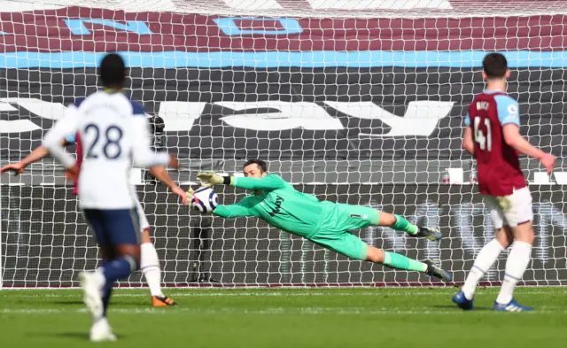 West Ham United's Polish goalkeeper Lukasz Fabianski (C) makes a save during the English Premier League football match between West Ham United and Tottenham Hotspur at The London Stadium,