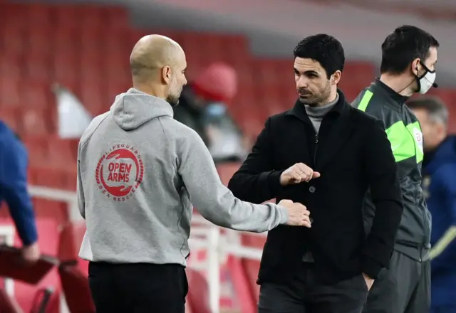 Pep Guardiola and Mikel Arteta