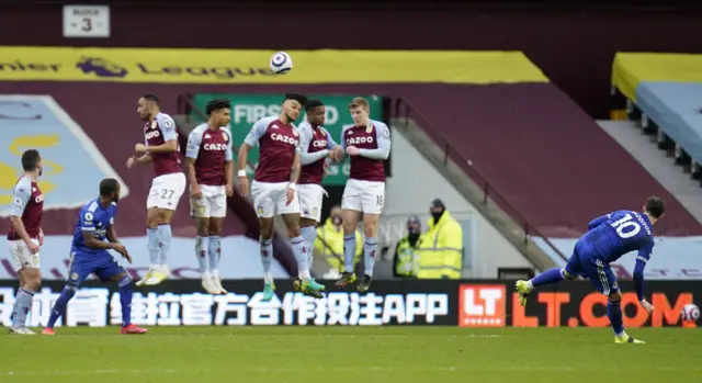 James Maddison takes a free-kick