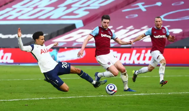 Declan Rice cuts out a cross