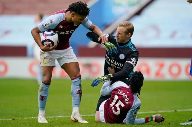 Kasper Schmeichel, Ollie Watkins and Bertrand Traore