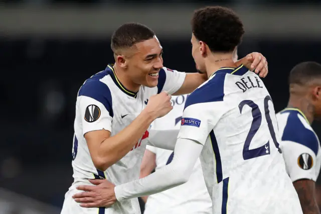 Carlos Vinicius celebrates with Dele Alli