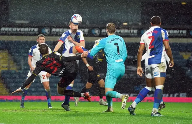 atfords Francisco Sierralta attempts an overhead kick