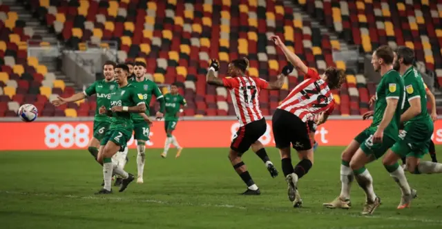 Brentford's Mads Bech Sorensen (29) scores their third goal