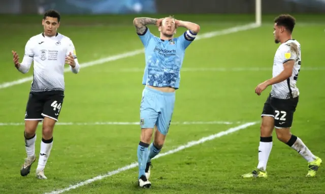 Coventry City's Kyle McFadzean reacts to his miss