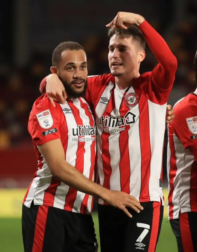 Brentford's Bryan Mbeumo (left) celebrates with team-mate Sergi Canos