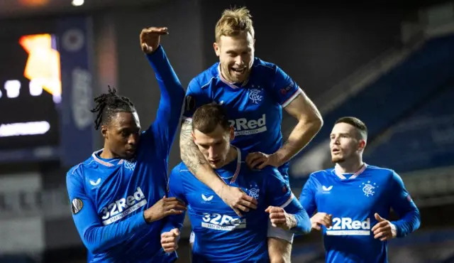 Rangers celebrate after Borna Barisic's third successful penalty in this tie