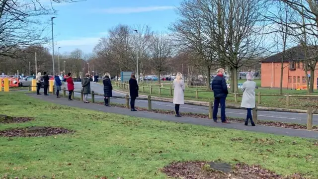 Jenny Stone's colleagues line the funeral procession route