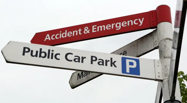 sign showing hospital car park