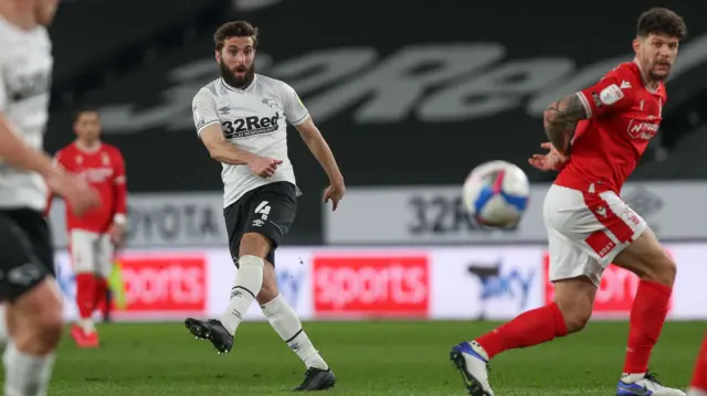 Graeme Shinnie shoots for Derby