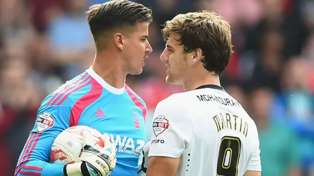 Karl Darlow and Chris Martin square up during Forest versus Derby back in 2014