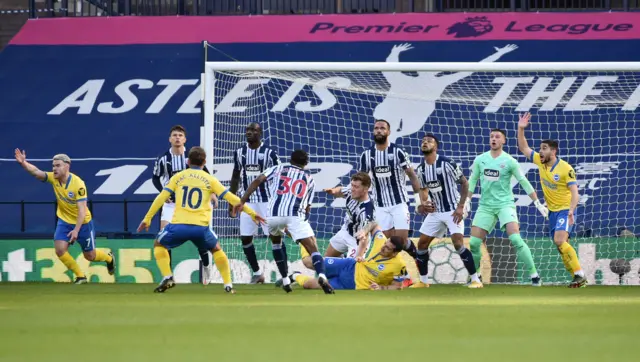 Brighton players appeal for a penalty