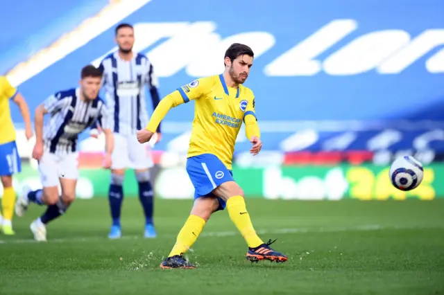 Pascal Gross takes a penalty