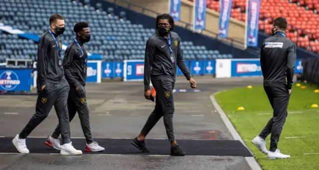 Livingston players step out of the tunnel at Hampden