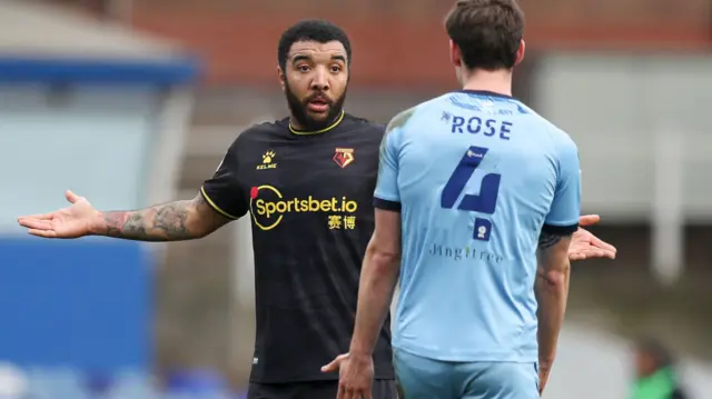 Troy Deeney (left) and Michael Rose