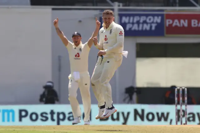 Dom Bess celebrates taking a wicket