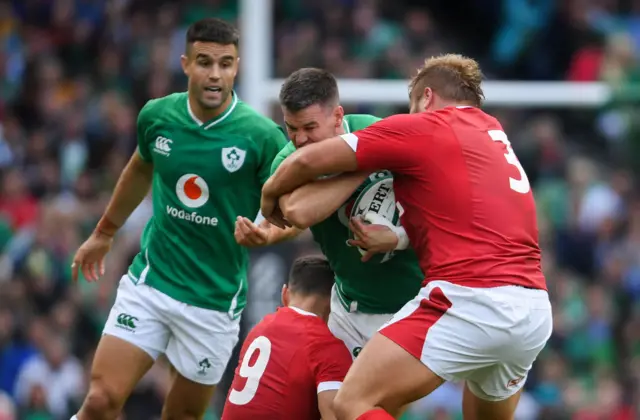 Tomos Francis tackle Johnny Sexton