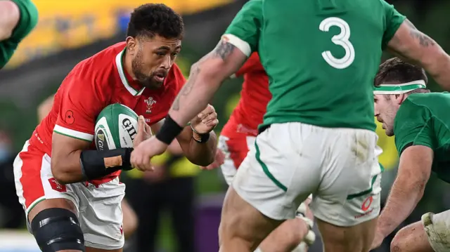 Wales' Taulupe Faletau takes on Ireland's defence