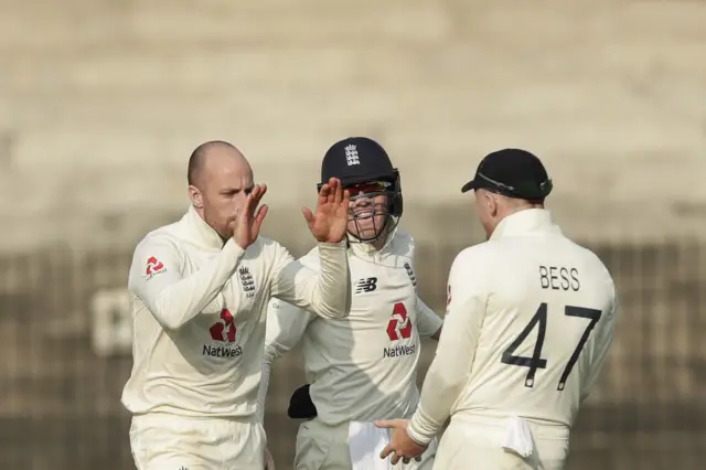 Jack Leach celebrates dismissing Rohit Sharma