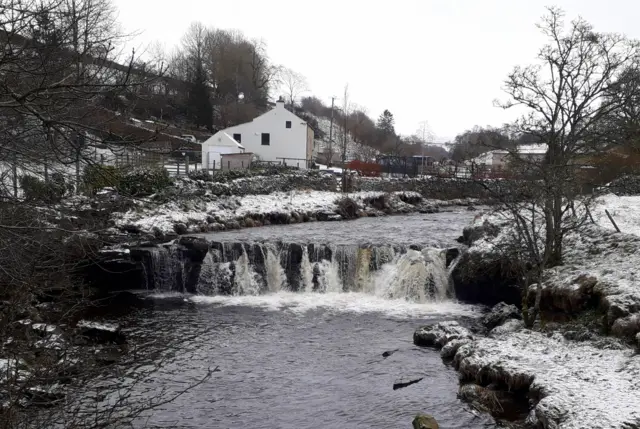 Snow around waterfall in Alston