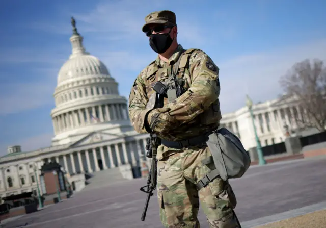 National Guard troops stand guard before the start of the second impeachment trial of former U.S. President Donald Trump February 9, 2021 in Washington, DC.