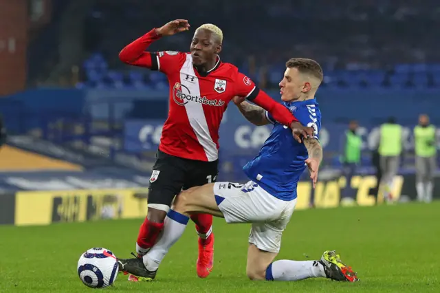 Lucas Digne fouls Moussa Djenepo