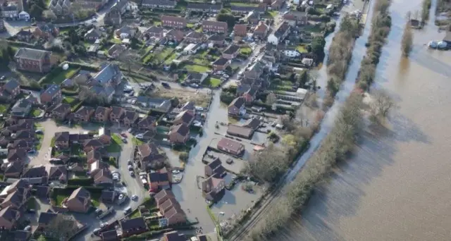 Homes flooded by the River Aire