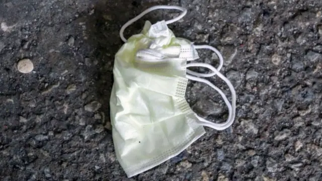 Discarded face mask