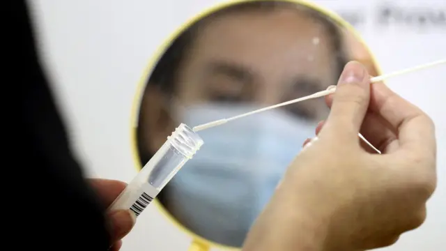 Person taking a Covid test
