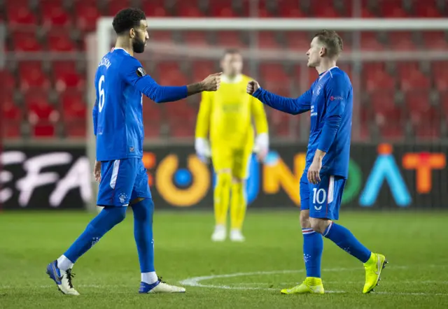 Steven Davis and Connor Goldson have just about enough energy for a fist bump at full-time