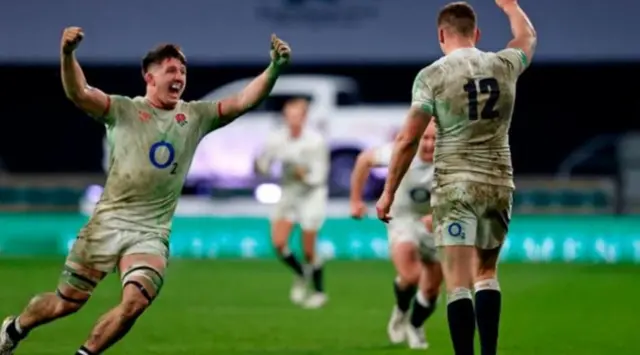 Owen Farrell and Tom Curry celebrate