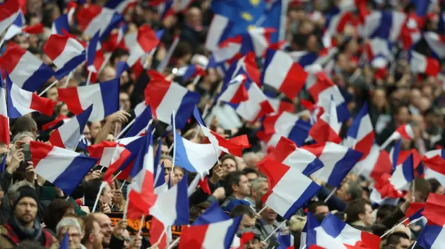 France fans wave flags