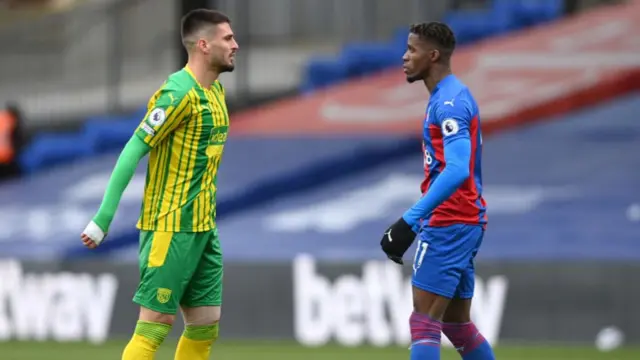 Wilfried Zaha and Okay Yokuslu