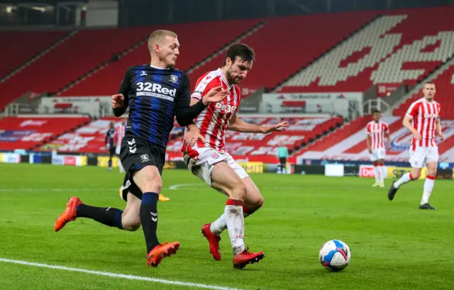 George Saville challenges Morgan Fox for the ball