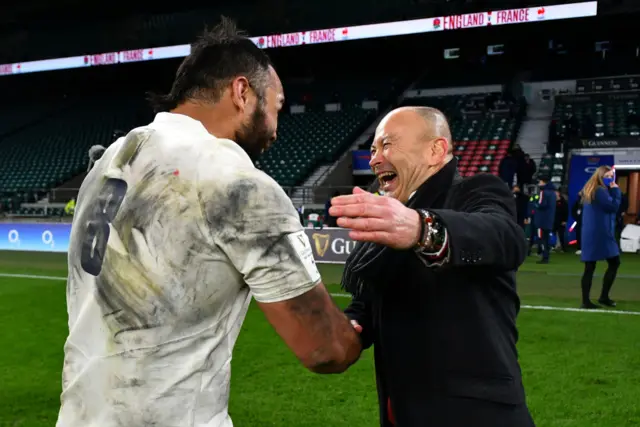 Eddie Jones laughs and shakes Billy Vunipola's hand