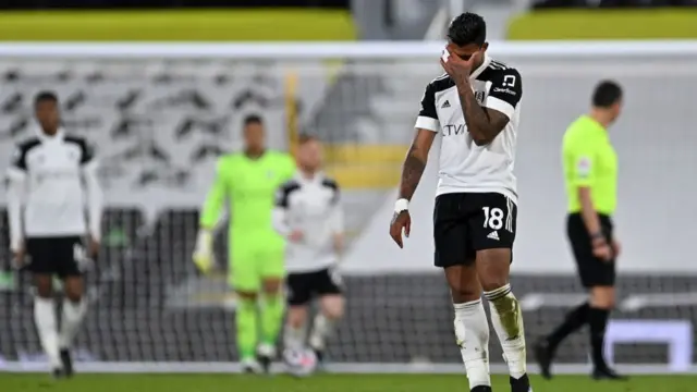 Fulham players after falling behind to Manchester City