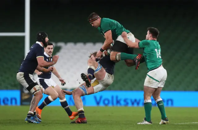 CJ Stander clashes with Jonny Gray in the Autumn Nations Cup