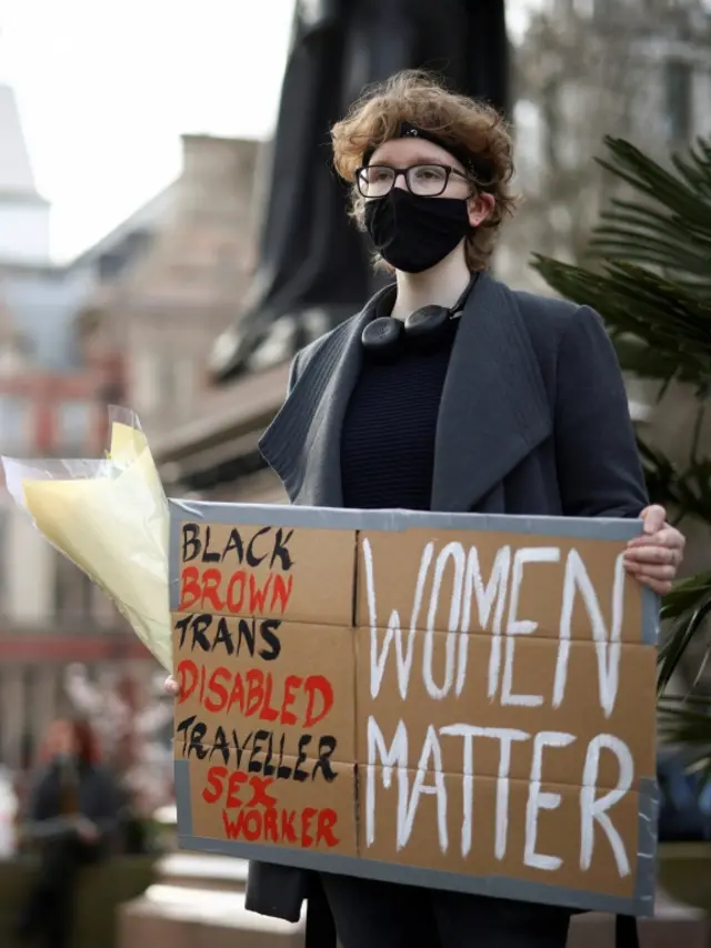 Person with a placard