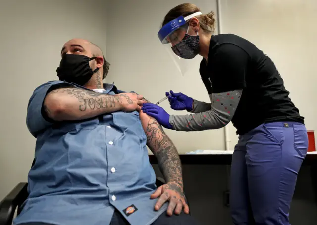 Inmate Christian Millett of Worcester gets his vaccine at the Worcester County Jail and House of Corrections in West Boylston, MA on Jan 22, 2021.