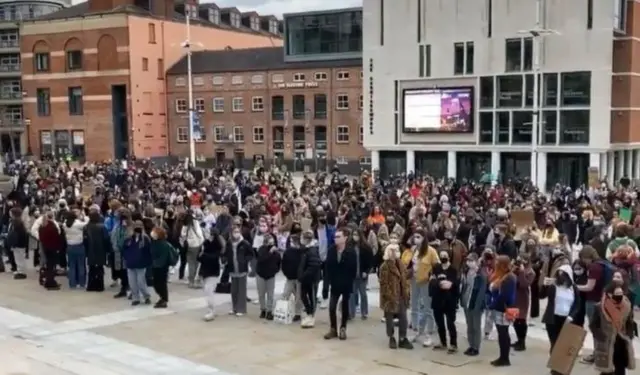 People in Millenium Square