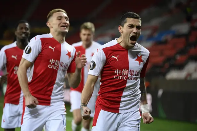 Slavia Prague's Nicolae Stanciu (right) celebrates scoring against Rangers