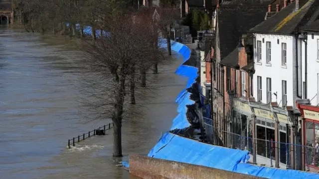 Flood defences are seen after being pushed back by high water levels, on the River Severn, Ironbridge