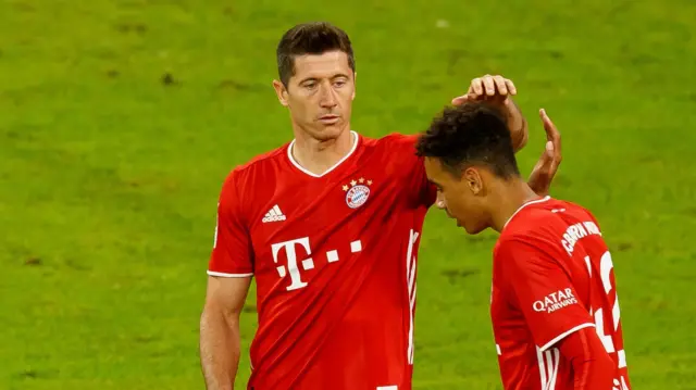 Robert Lewandowski and Jamal Musiala