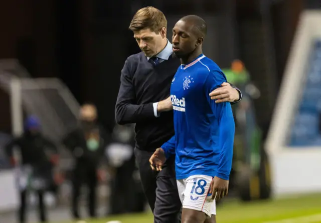 Rangers manager Steven Gerrard comforts Glen Kamara