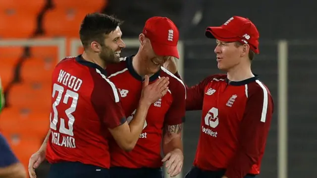 Mark Wood, Ben Stokes and Eoin Morgan