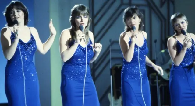 Coleen (far left) performing with sisters Maureen, Bernie and Linda in 1982