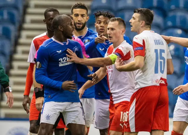 Rangers' Glen Kamara complains to Slavia's Ondrej Kudela