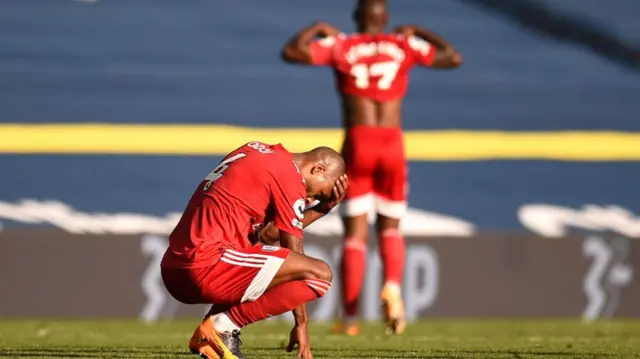 Denis Odoi reacts at the full time whistle after Leeds beat Fulham