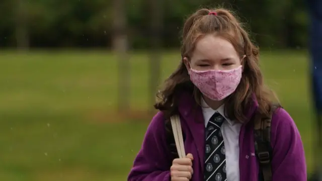 pupil in face mask