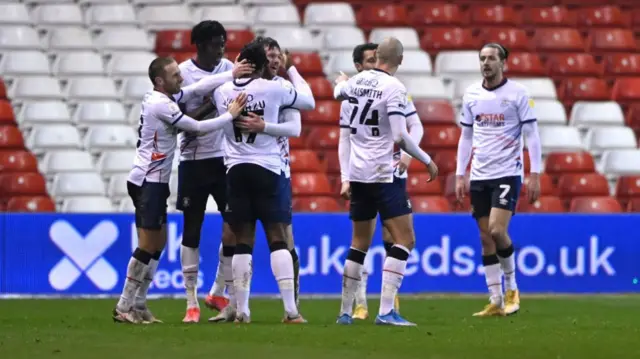 Luton players celebrate